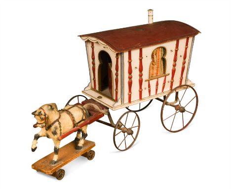 with Thistle trade mark registered in 1910, the wooden carriage in red and white with shaped windows and doors, a ladder, on 