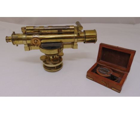 A brass&nbsp;19th Century surveyor’s level by Thomas Street of London on a revolving circular base, 18 x 32.5cm and a cased b