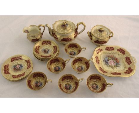 Aynsley J A Bailey tea service, hand painted and gilded against a red ground, to include a teapot, milk jug, sugar bowl, cake