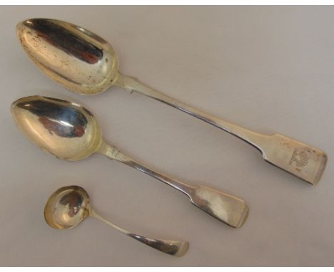 Three silver spoons to include a Georgian basting spoon, William IV tablespoon and a sauce ladle, approx total weight 224g