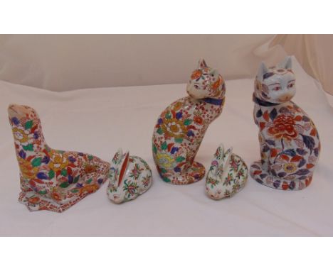 A quantity of Chinese ceramic figurines to include two cats, two rabbits and a seal, tallest 26cm (h)