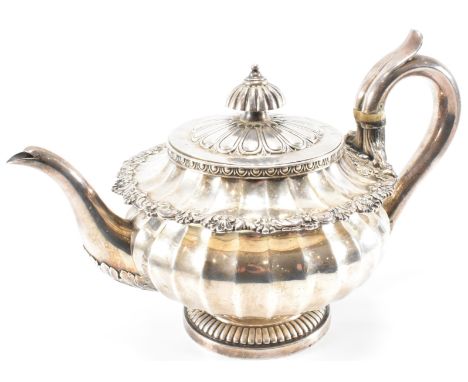 An early 19th Century George IV hallmarked silver teapot by&nbsp;Rundell, Bridge &amp; Rundell (John Bridge). The teapot havi