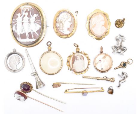 A collection of white and yellow metal jewellery. To include three yellow metal cameo brooches, an agate cameo stick pin, a g