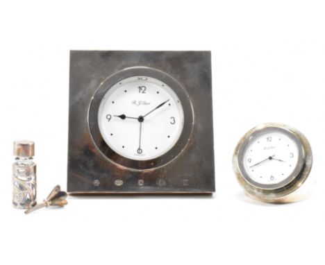 Two silver hallmarked Carrs of Sheffield desk clocks to include one having a round white enamelled face with a filled silver 