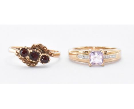 Two hallmarked 9ct gold gem set rings. The rings to include a modern ring set with a princess cut amethyst together with a ga