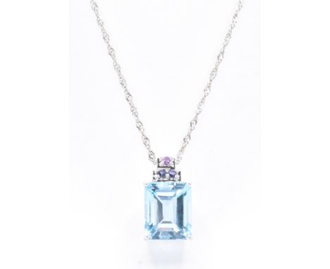 A 9ct white gold pendant necklace. The pendant being set with a rectangular cut topaz, with further coloured stones to the ba