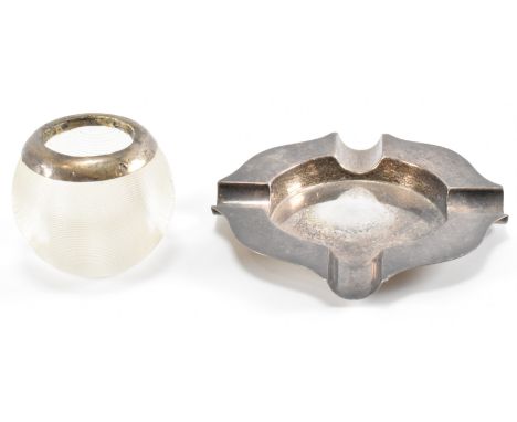A vintage Adie Brothers silver hallmarked ash tray having four cigarette rests together with a glass and silver collared matc