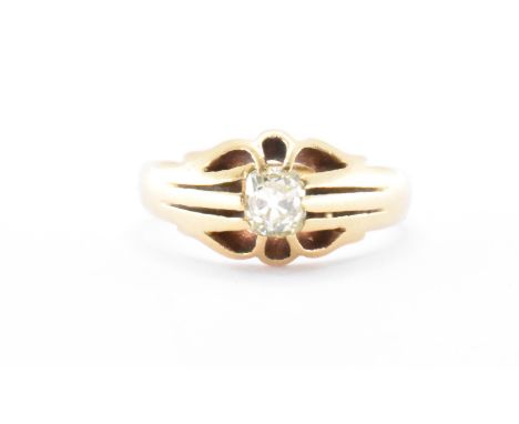 An 18ct gold diamond ring. The ring having a central round cut diamond within a buttercup setting. Marked 18ct. Ring size L.5