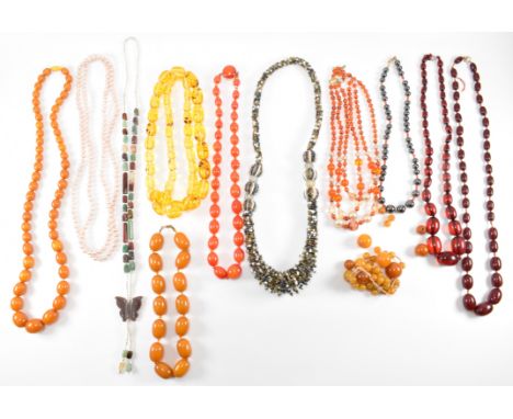A collection of vintage and modern necklaces. The necklaces to include pink cultured pearls, quartz varieties, micro beads, a