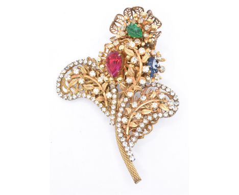 A 1960s vintage signed Amourelle Frank Hess floral spray brooch pin. The brooch having layered&nbsp; filigree work set with r