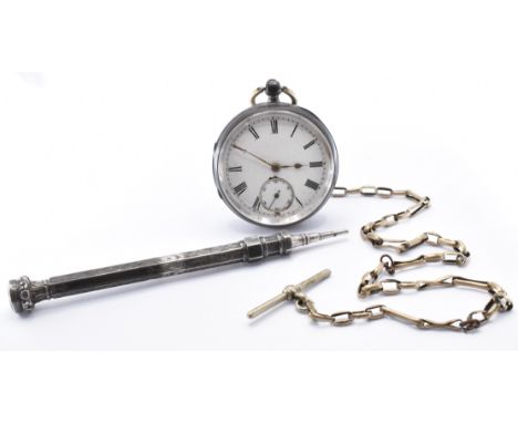 A 19th Century Victorian silver hallmarked pocket watch having a round white enamelled face with roman numerals to the chapte