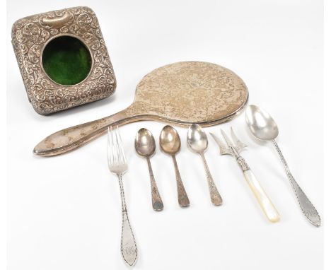A collection of silver hallmarked items to include a an Edwardian silver fronted photo frame, a Levi &amp; Salaman spoon and 