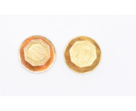 A pair of cased Art Deco 9ct gold collar studs having octagonal heads with engraved sunburst decoration and round backs. Both
