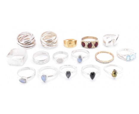 A group of sixteen silver rings in a variety of styles. The lot to include crossover rings, stone set examples including labr