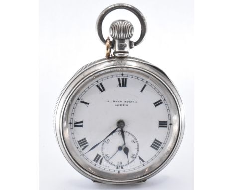 A 1930's silver hallmarked Harris Stone of Leeds open face pocket watch. The watch having a white enamelled dial with roman n