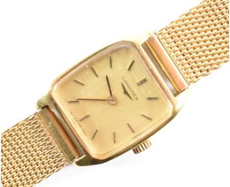 A Longines stainless steel wrist watch. The watch having a square face with a gilt dial and baton markings to the chapter rin