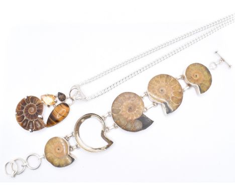 A 925 silver and fossil ammonite bracelet and pendant necklace. The necklace strung with a citrine quartz and tigers eye with