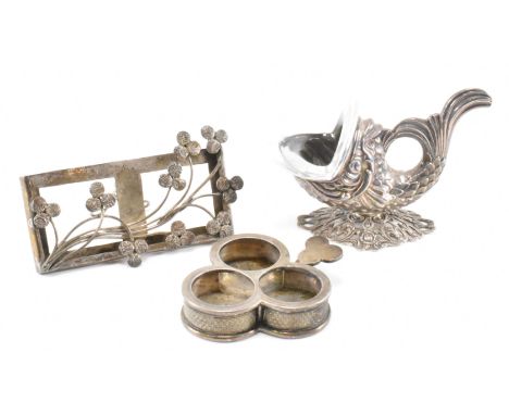A group of silver items to include a 19th Century Victorian Thomas Johnson 1876 London hallmarked tre foil cruet stand with e