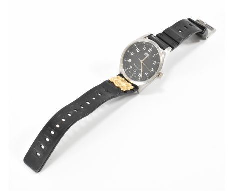 An Oris automatic twenty five jewels wrist watch. The watch having a round face with a black dial, arabic numerals to the cha