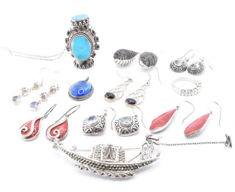 An assortment of silver jewellery to include a silver and marcasite brooch Envoy Incabloc watch brooch in the form of a Venet