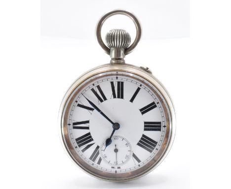 An early 20th Century white metal open face goliath pocket watch having a white enamelled dial with roman numerals to the cha