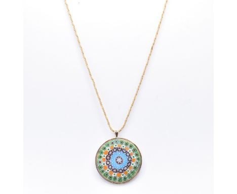 An 18ct gold rope twist necklace chain having a glass millefiori pendant set within a yellow metal mount. Chain marked 750 wi