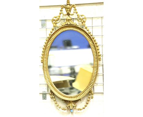 A modern Regency style gilt framed oval wall mirror, 90 x 50 cm. Not available for in-house P&amp;P, contact Paul O'Hea at Ma