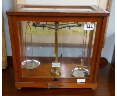 Cased scientific scales by Philip Harris Co Let 