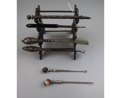 Interesting stand with button hooks, shoehorns etc to include silver handled examples 