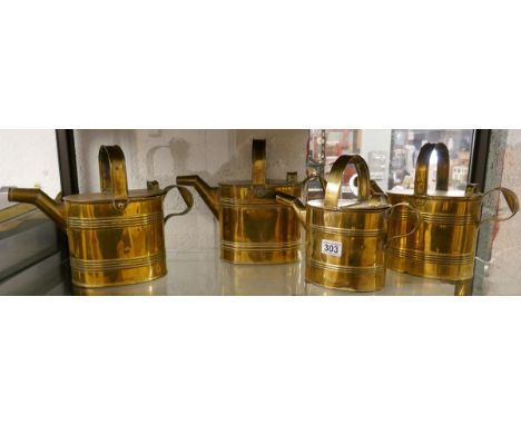4 Vintage brass watering cans 