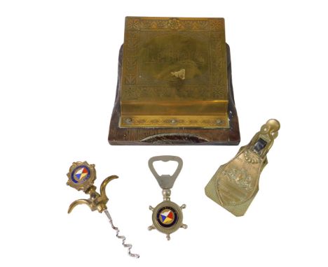 An early 20thC brass 'Letters' rack, oak backed, together with a Merry Phipson &amp; Parker brass letter clip, No 24 regd Oct