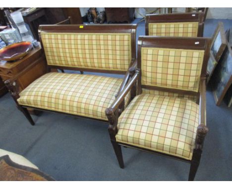 A reproduction Regency style mahogany two seater carved sofa and two matching armchairsLocation: 