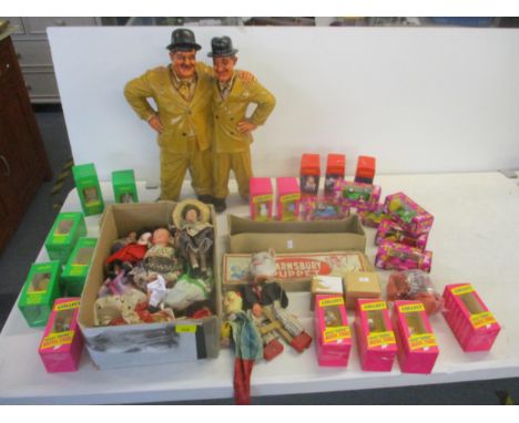 A mixed lot to include a boxed Barnsbury puppet of a cat, a composition model of Laurel &amp; Hardy, Tetley tea collectables 