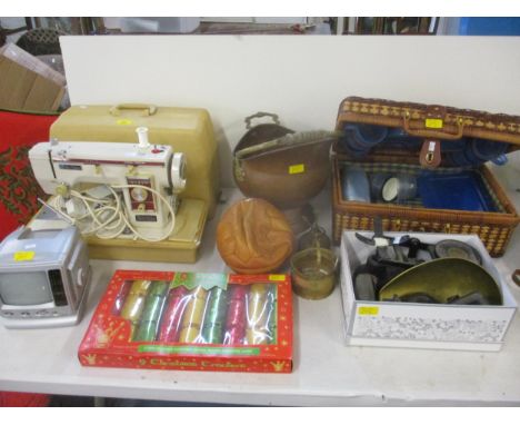 A mixed lot to include a cased New Home sewing machine type M-1200, serial number 022070, kitchen scales, picnic basket, a pe