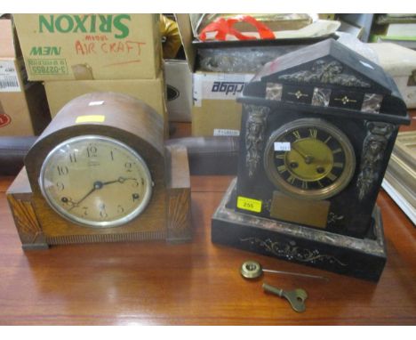 An Edwardian black slate and marble mantle clock, gilt dial with black enamelled chapter ring having Roman numerals, gilt bra