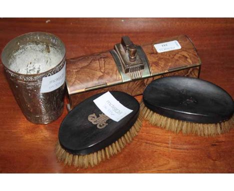 ART DECO CIGARETTE BOX WITH CENTRAL LIGHTER
and a pair of gentleman's hair brushes and an eastern brass beaker