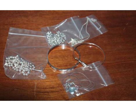 GOOD GROUP OF DESIGNER JEWELLERY
including Swarovski pendants, Swarovski bangle, an Old Florence silver necklace and bracelet