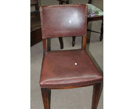 SET OF FIVE OAK AND STUDDED LEATHER DINING CHAIRS
back and seat studded with brown leather; together with an Edwardian mahoga