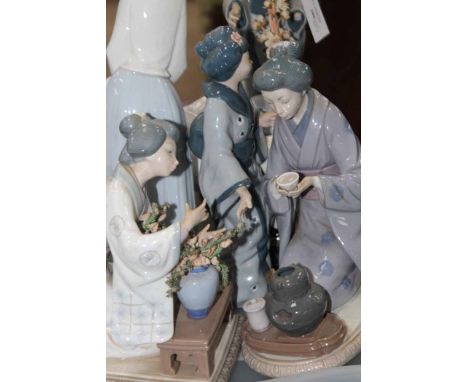 COLLECTION OF LLADRO AND NAO FIGURES
including a Lladro Geisha figure,a nao figure of a child, a pair of nao figures of a man