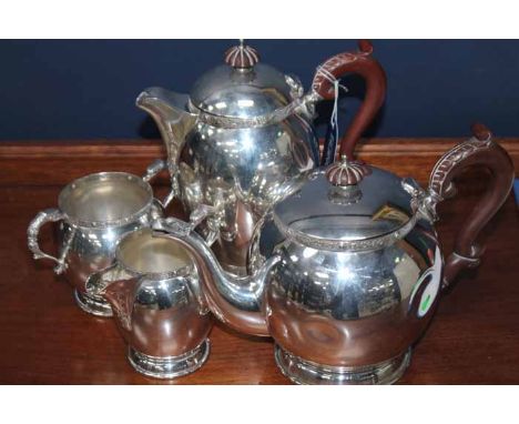 EARLY 20TH CENTURY SILVER PLATED FOUR PIECE TEA SERVICE
with Celtic inspired borders, handles and spout, hot water pot 22cm h