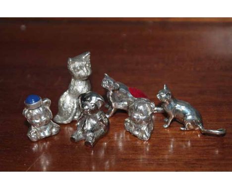 SIX SILVER MINIATURE FIGURES
including a cat pin cushion, two other cat figures; together with three teddy bear figures, larg