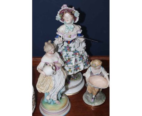 THREE CERAMIC FIGURES OF WOMEN
and an Oban Pottery China tea service