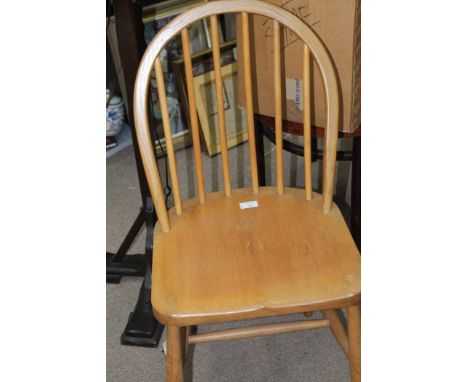 PAIR OF ERCOL "GOLDEN OAK" CHAIRS
with label, 83cm high; together with a similar Ercol armchair (3)