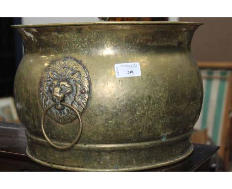 CIRCULAR BRASS PLANTER
with lion mask ring handles; together with a brass kettle (2)