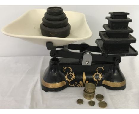 Gold detail to scales.  Come with 2 sets of lead weights. 