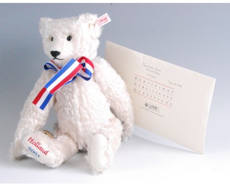 A modern Steiff Maatjes Bear, in white mohair with button to ear and white tag no. 661082, limited edition no. 01215/1500, wi