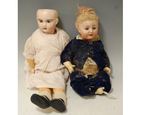 A Jules Verlingue Petit Française bisque head doll, having fixed blue eyes, open mouth with five top teeth showing, having jo