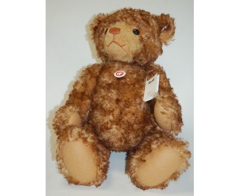 A modern Steiff teddy-bear 'Little Tom', in brown tipped mohair, with button in ear and jointed limbs, limited edition No.350