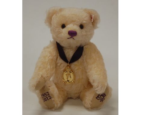 A modern Steiff teddy-bear 'Diamond Jubilee', in vanilla mohair, with button to ear and jointed body, No.1815 of a production