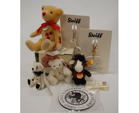 A modern Steiff 'Alpaca' teddy-bear, in white mohair, with button to ear and jointed body, h.10cm, boxed; together with a Ste